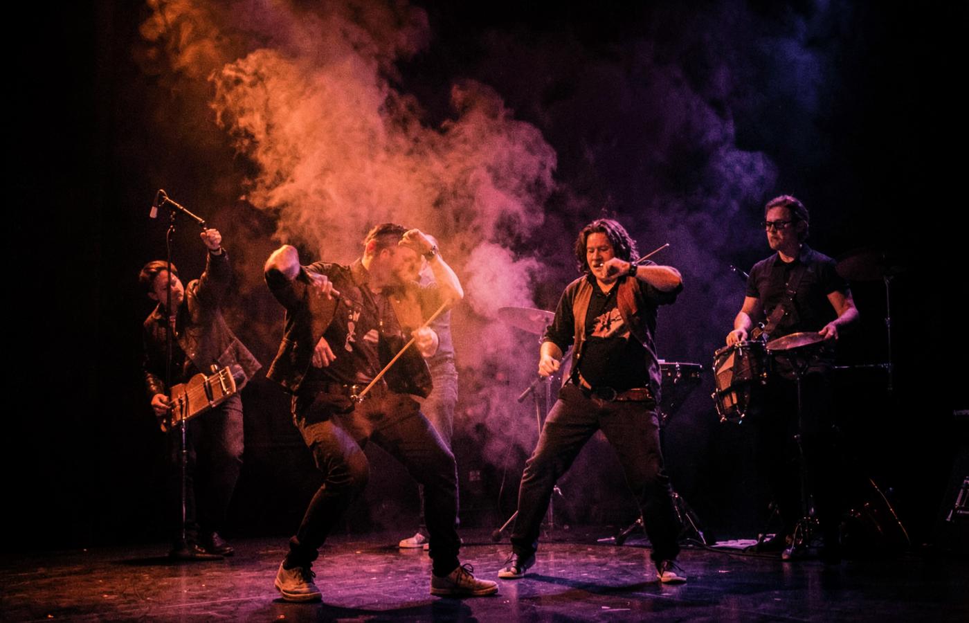 Dancers and musicians improvising together on stage