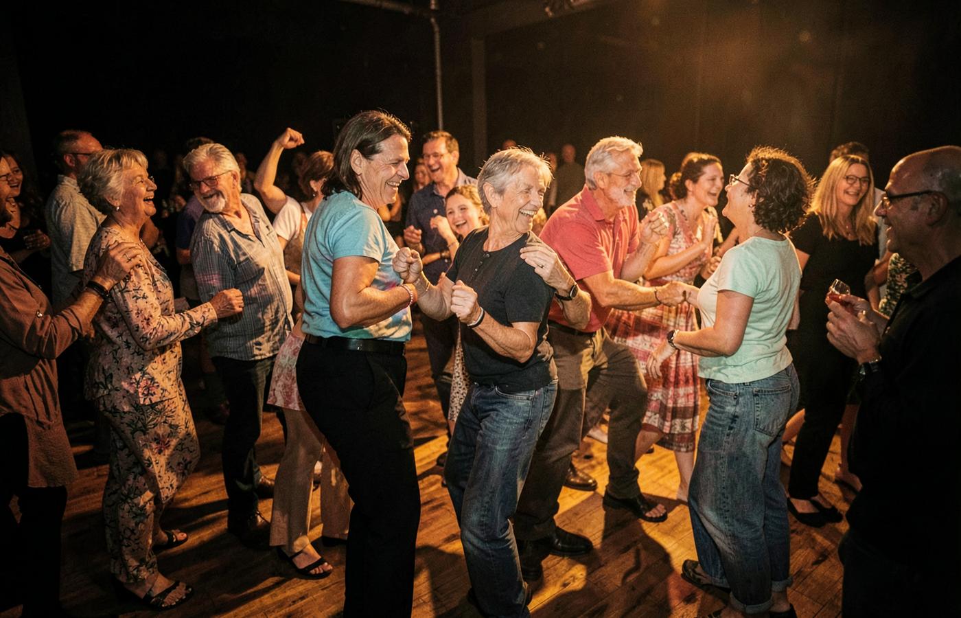 Diverse group of people of all ages social dancing together